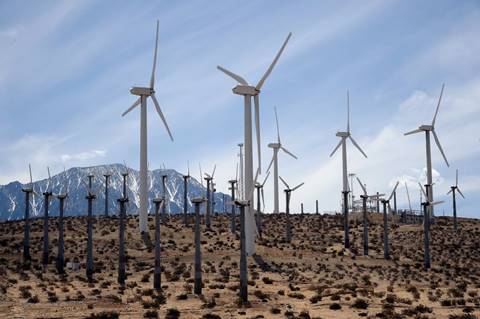 Giant wind turbines are powered by strong winds on March 27, 2013 in Palm Springs, California. According to reports, California continues its lead in green technology and has the lowest GHG emissions per capita, in the Nation. (Photo by Kevork Djansezian/Getty Images) Photo: Kevork Djansezian, Getty Images