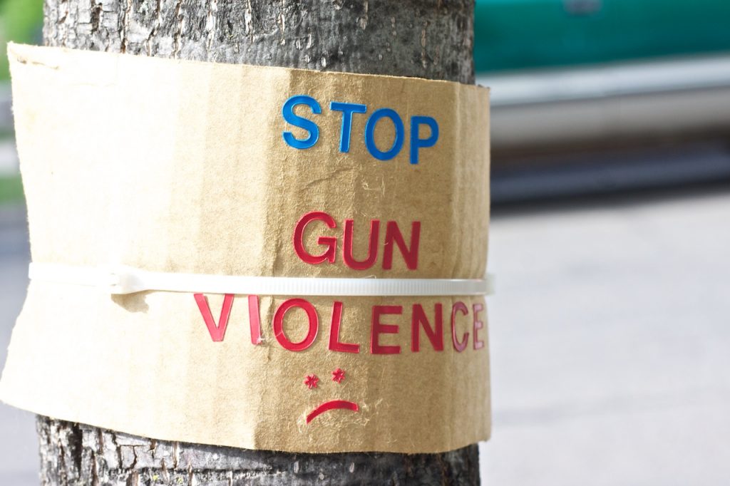 stop_gun_violence_sad_face_sign_4573522770