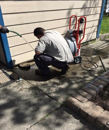 Stationary Enginner clearing sewer line at Men & Women of Valor Center