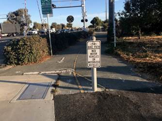 Ohio and Garrard new bike path signs on bollards
