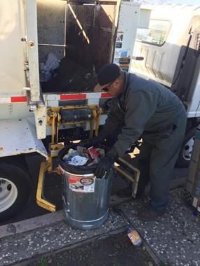 Trash recepticle servicing throughout city