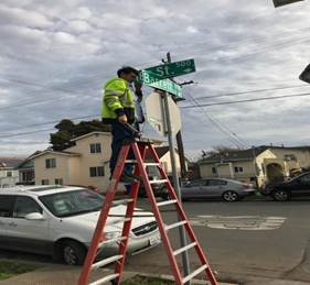 18th st. and Barrett street name sigs installed at northwest corner.