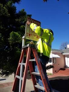 Street Sweeping signs installed at Panther Ave