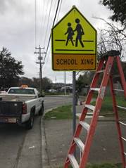 School X-ing sign repaired at Cypress and Ells st