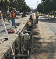Forde installing sewer main and connecting laterals