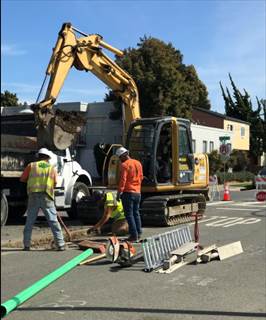 Forde installing sewer pipe Nevin and 27th