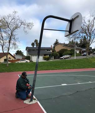 Basketball pole removal