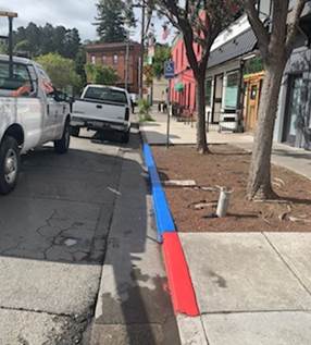 Blue and Red Curb refresh at 120 railroad Ave