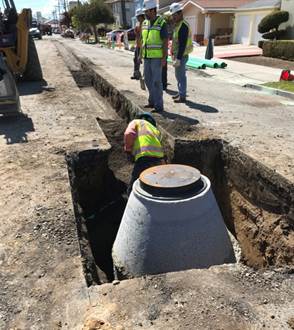 New manhole 2 28th Street Mac virg