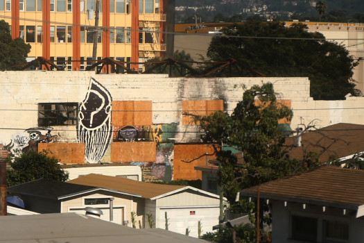 The Ghost Ship warehouse were 36 people died on the night of Dec. 2, 2016, still boarded up as seen from East 12th Street in Oakland, Calif., on Friday, Oct. 27, 2017. (Ray Chavez/Bay Area News Group)